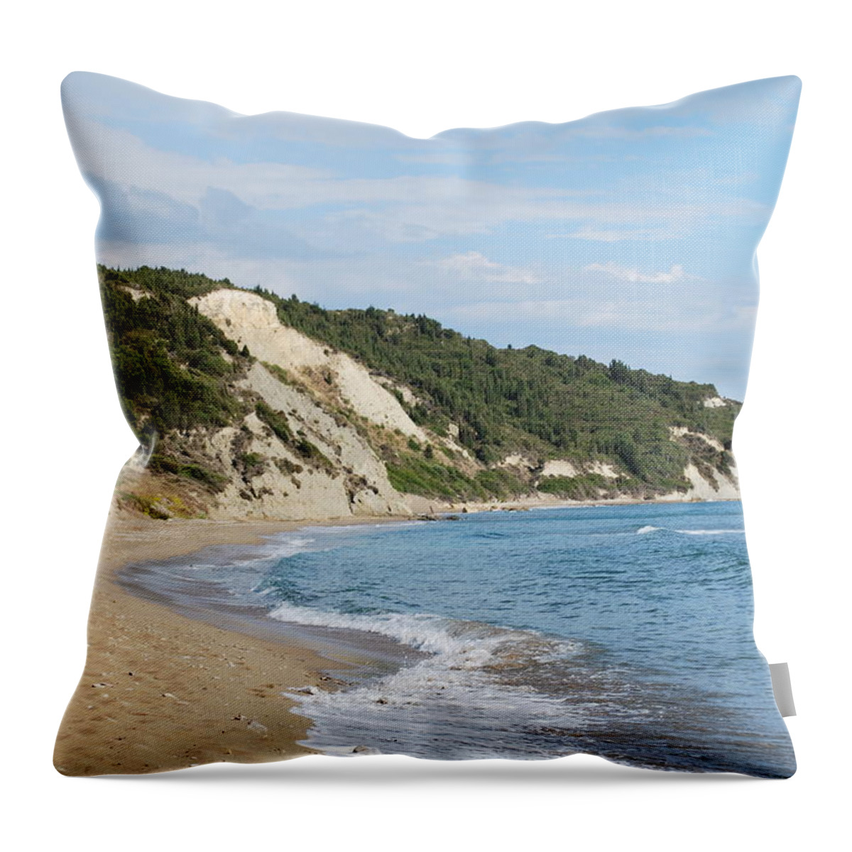 Beach Throw Pillow featuring the photograph By the beach by George Katechis
