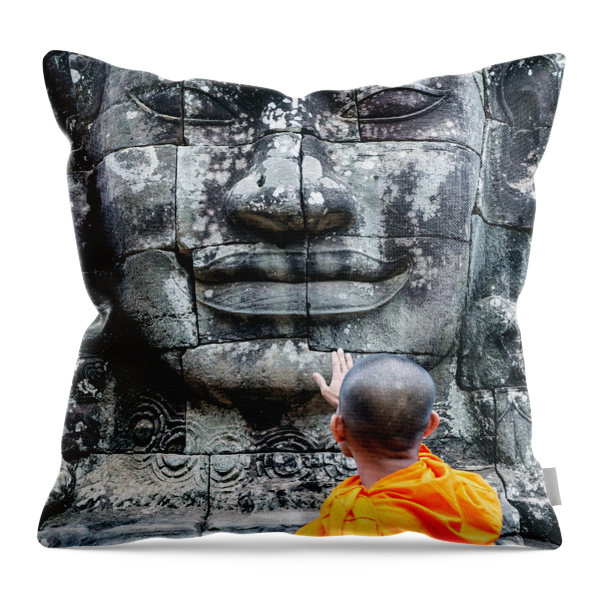 Buddha Throw Pillow featuring the photograph Cambodia - Angkor Wat - Monk touching giant Buddha statue by Matteo Colombo