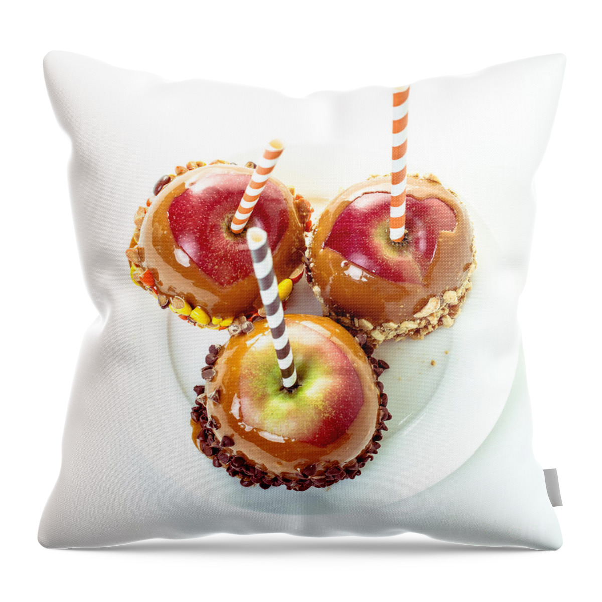 Candy Throw Pillow featuring the photograph Caramel Apples by Edward Fielding
