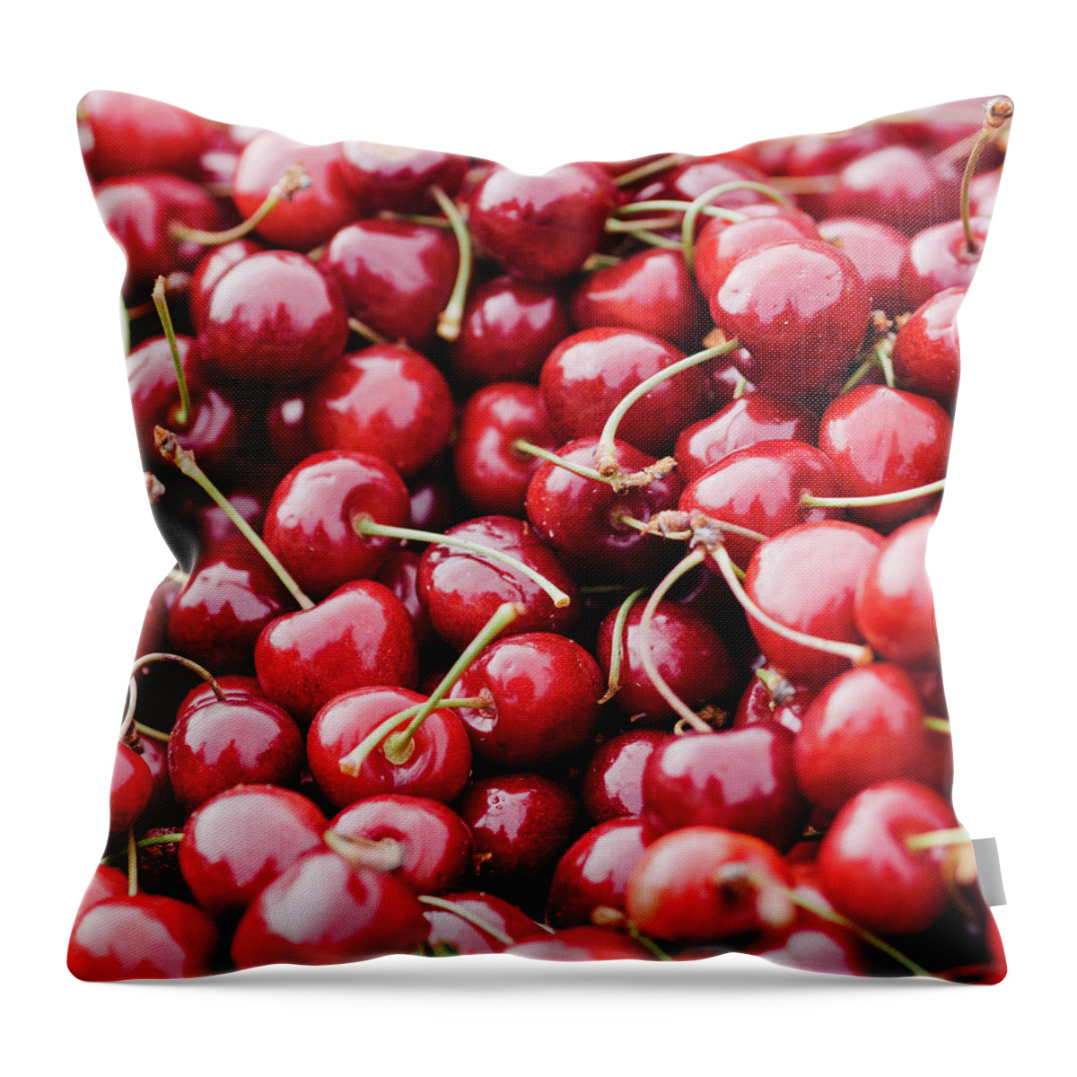 Cherry Throw Pillow featuring the photograph Closeup Of Fresh Cherries by Miemo Penttinen - Miemo.net