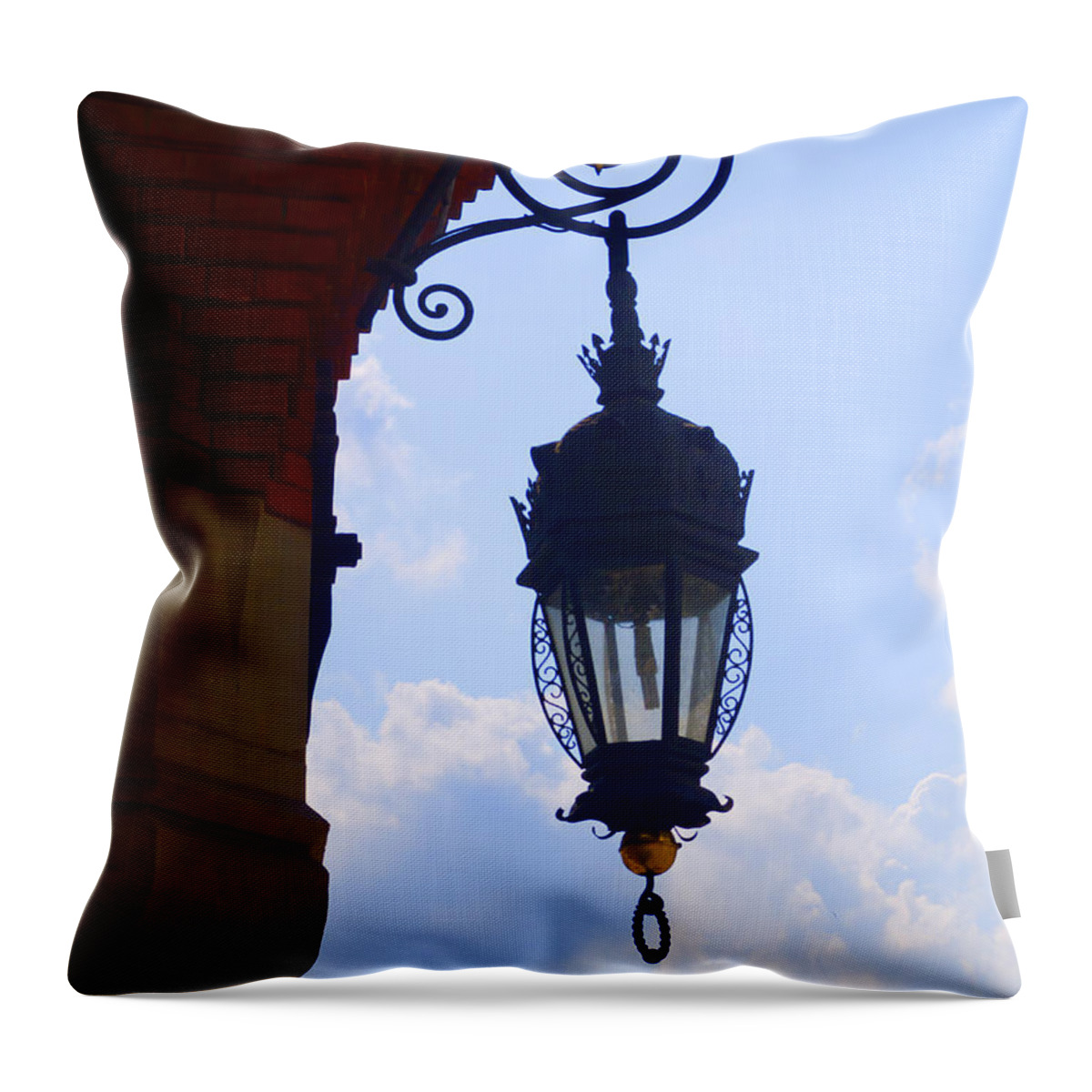 Krakow Throw Pillow featuring the photograph Cloth Hall Lamp by Brenda Kean