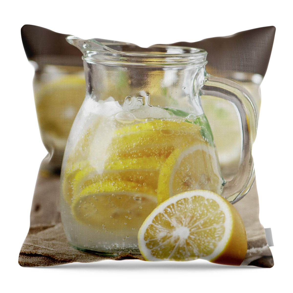 Transparent Throw Pillow featuring the photograph Cold Lemon Water by Oxana Denezhkina