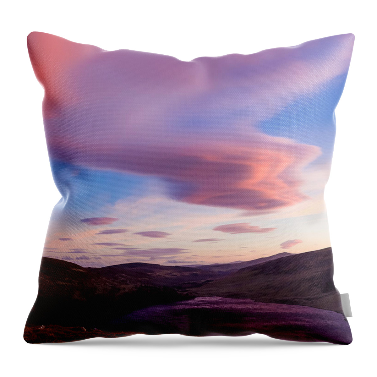 Blue Throw Pillow featuring the photograph Colourful clouds over Lough Tay in Wicklow by Semmick Photo