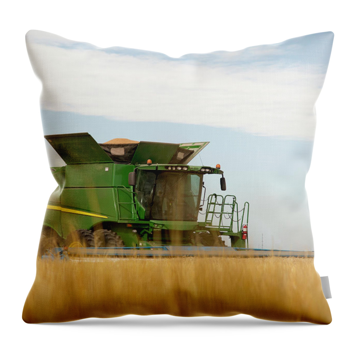 Combine Throw Pillow featuring the photograph Combine Cuts Wheat In Northeast by Kevan Dee