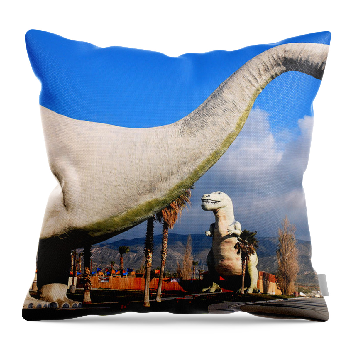 Cabazon Throw Pillow featuring the photograph Dinosaurs of Cabazon by James Kirkikis