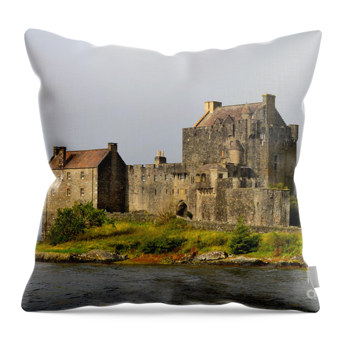 Eilean Donan Throw Pillow featuring the photograph Eilean Donan Castle in Scotland by DejaVu Designs