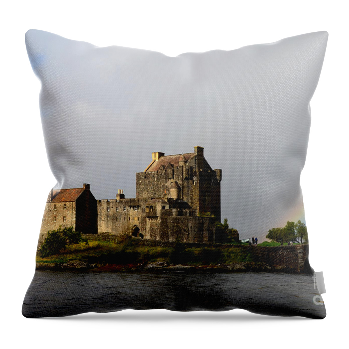 Eilean Donan Throw Pillow featuring the photograph Eilean Donan with a Rainbow by DejaVu Designs