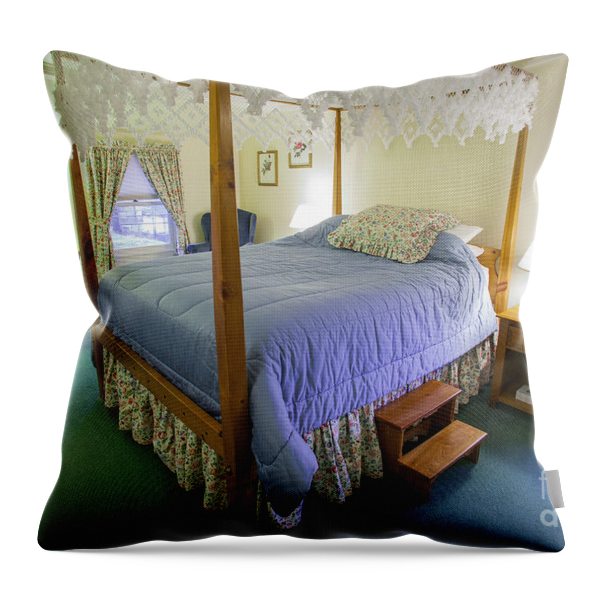 Apartment Throw Pillow featuring the photograph Fancy canopy bed in a cozy hotel bedroom. by Don Landwehrle