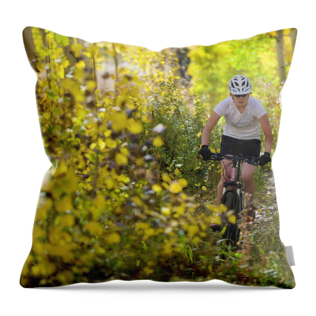 30-34 Years Throw Pillow featuring the photograph Female Mountain Biker Riding by Scott Markewitz