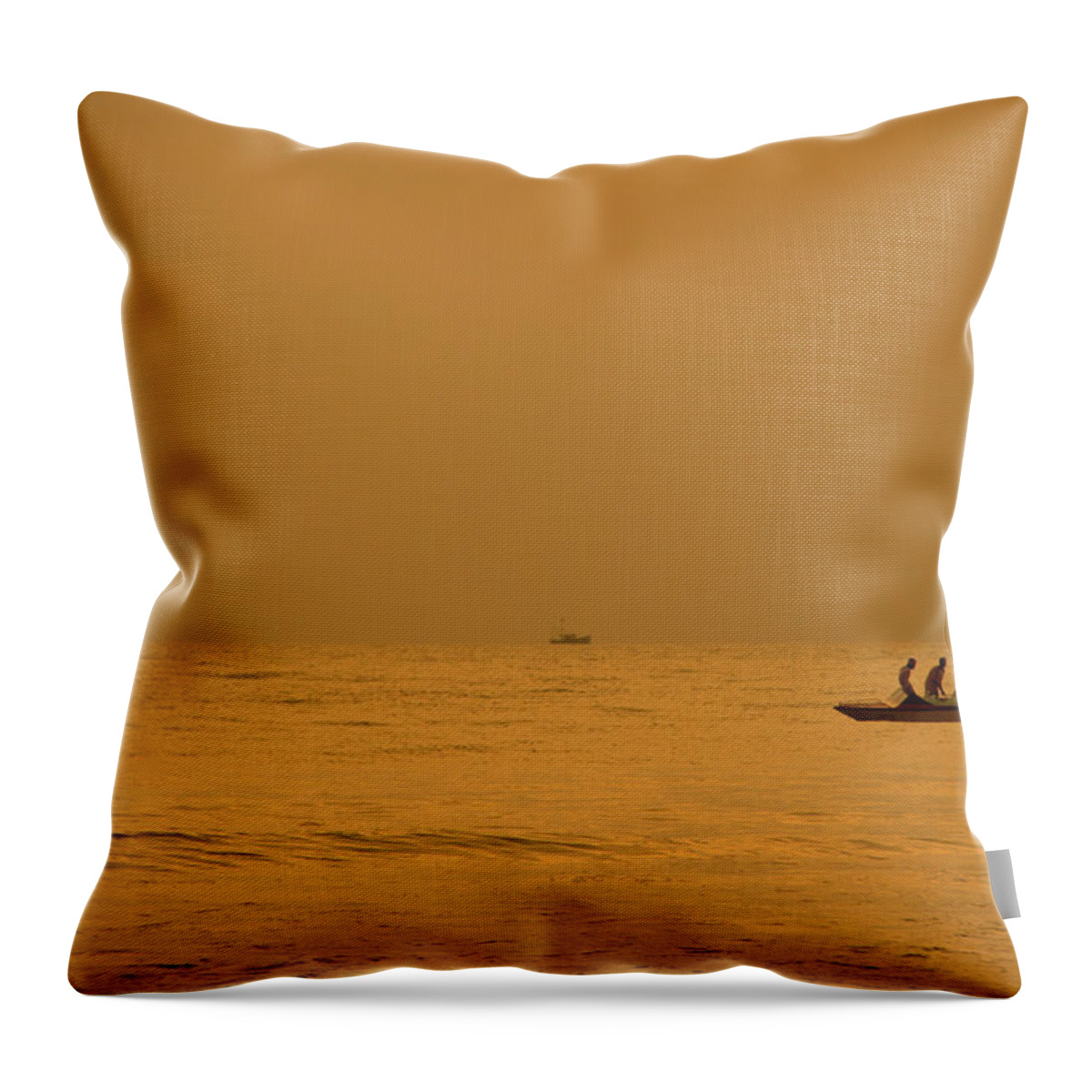 Orange Color Throw Pillow featuring the photograph Fishreman Catching Fish At Payyambalam by Raja Singh - Bling Photography