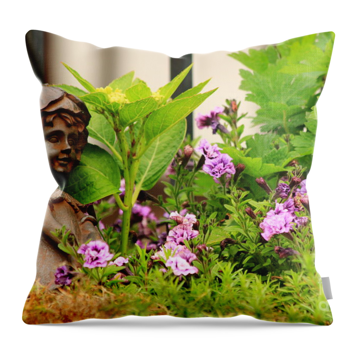 Angel Throw Pillow featuring the photograph Flower-bed mit an angel statue by Amanda Mohler