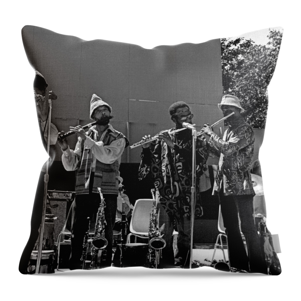 Sun Ra Arkestra Throw Pillow featuring the photograph Four Flutes 2 by Lee Santa