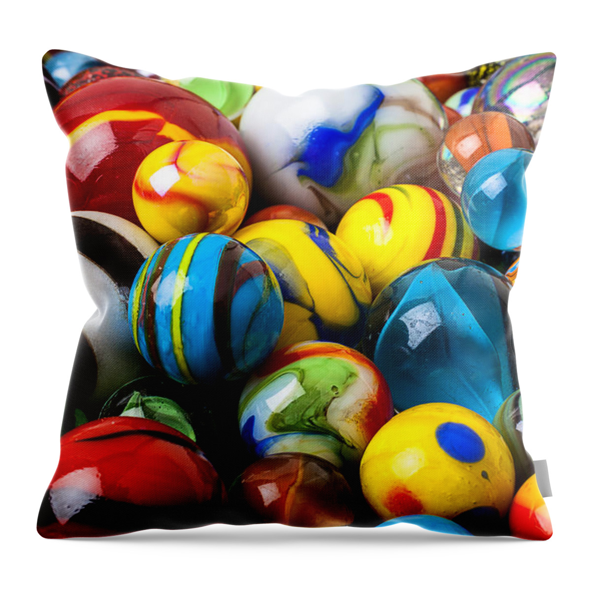 Pile Throw Pillow featuring the photograph Glass marbles by Garry Gay