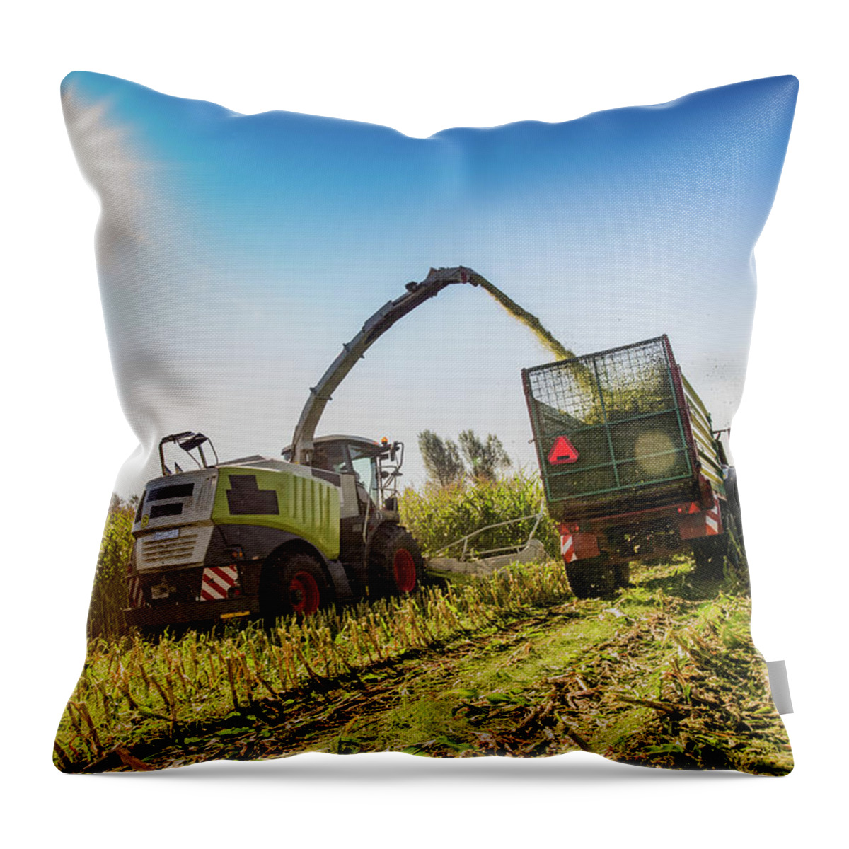 Dust Throw Pillow featuring the photograph Harvesting In Field by Simonkr
