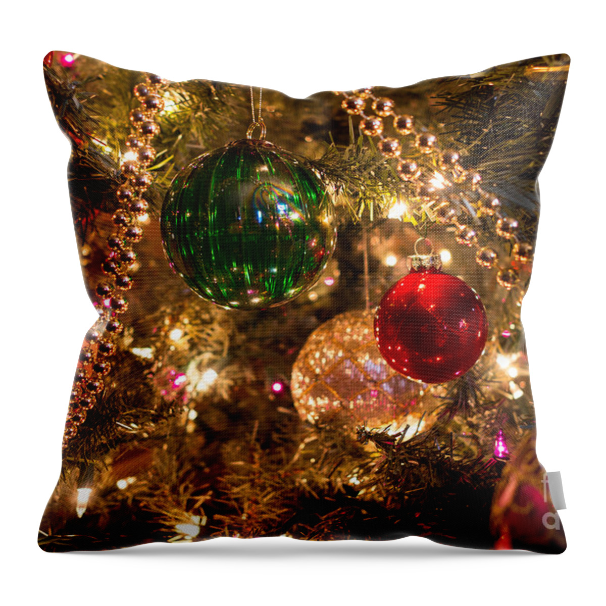 Christmas Throw Pillow featuring the photograph Holiday Ornaments on a Christmas tree by Amy Cicconi