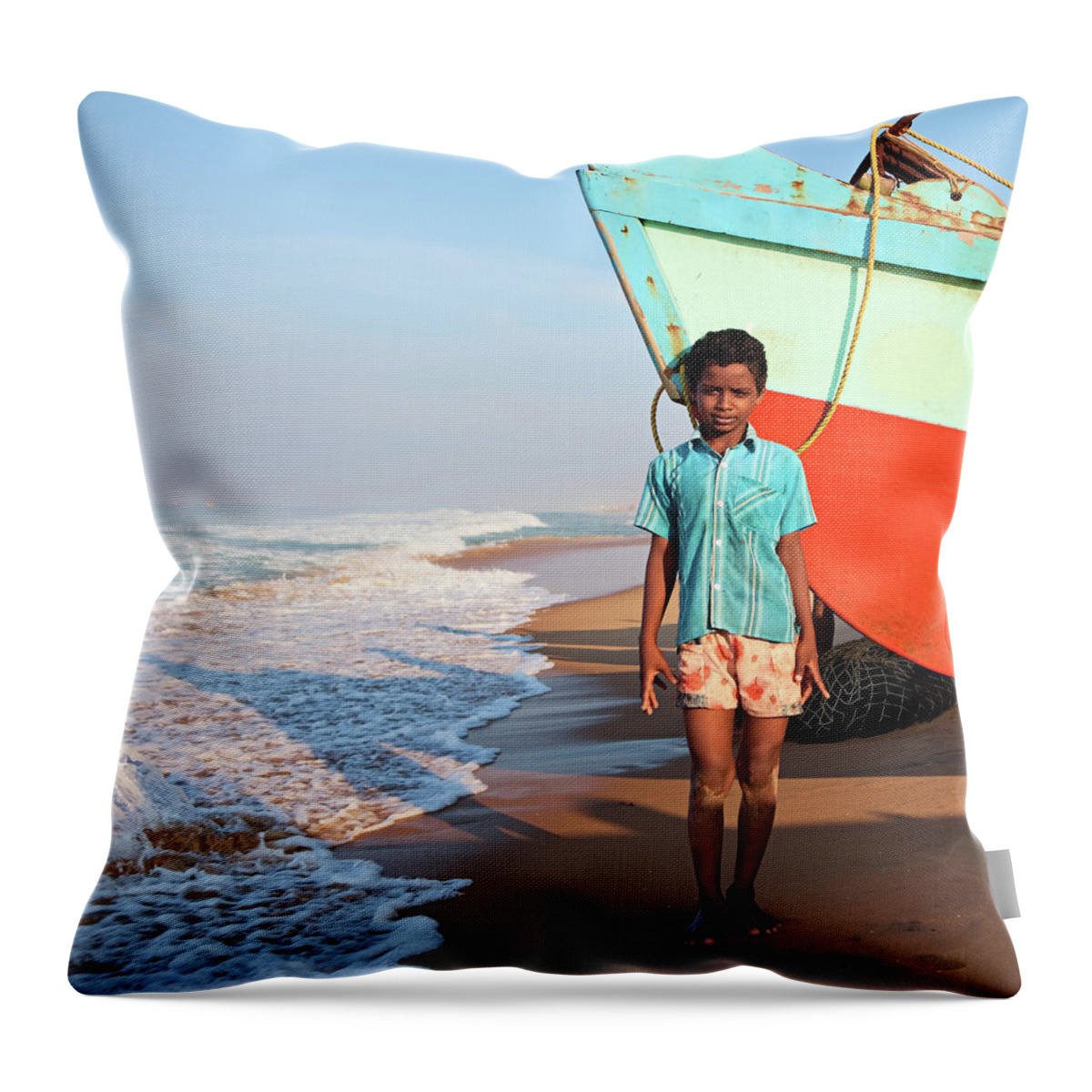 Water's Edge Throw Pillow featuring the photograph Indian Boy On The Beach by Hadynyah