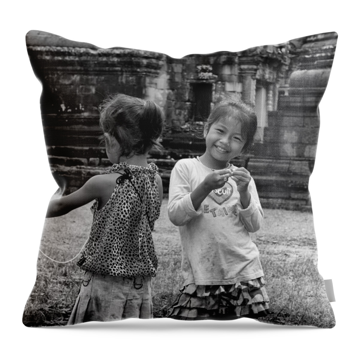 Asia Throw Pillow featuring the photograph Khmer Smile by Joerg Lingnau