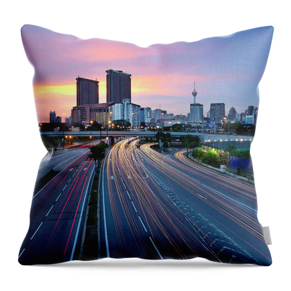 Built Structure Throw Pillow featuring the photograph Kuala Lumpur City At Sunset With Light by Tuah Roslan