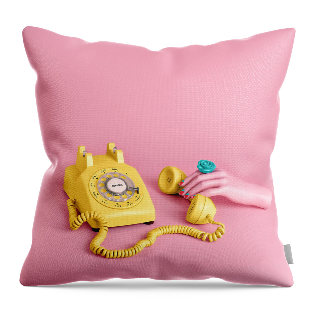 Artificial Throw Pillow featuring the photograph Mannequin Hand Holding Yellow Rotary by Juj Winn