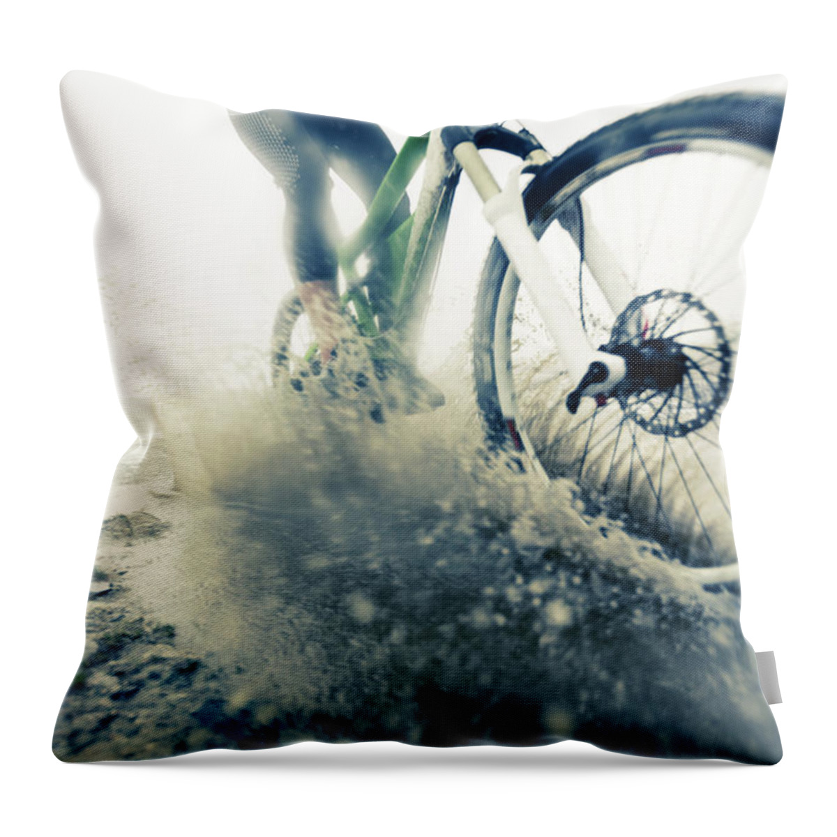 People Throw Pillow featuring the photograph Mountain Biker Racing Through Puddle by Nullplus