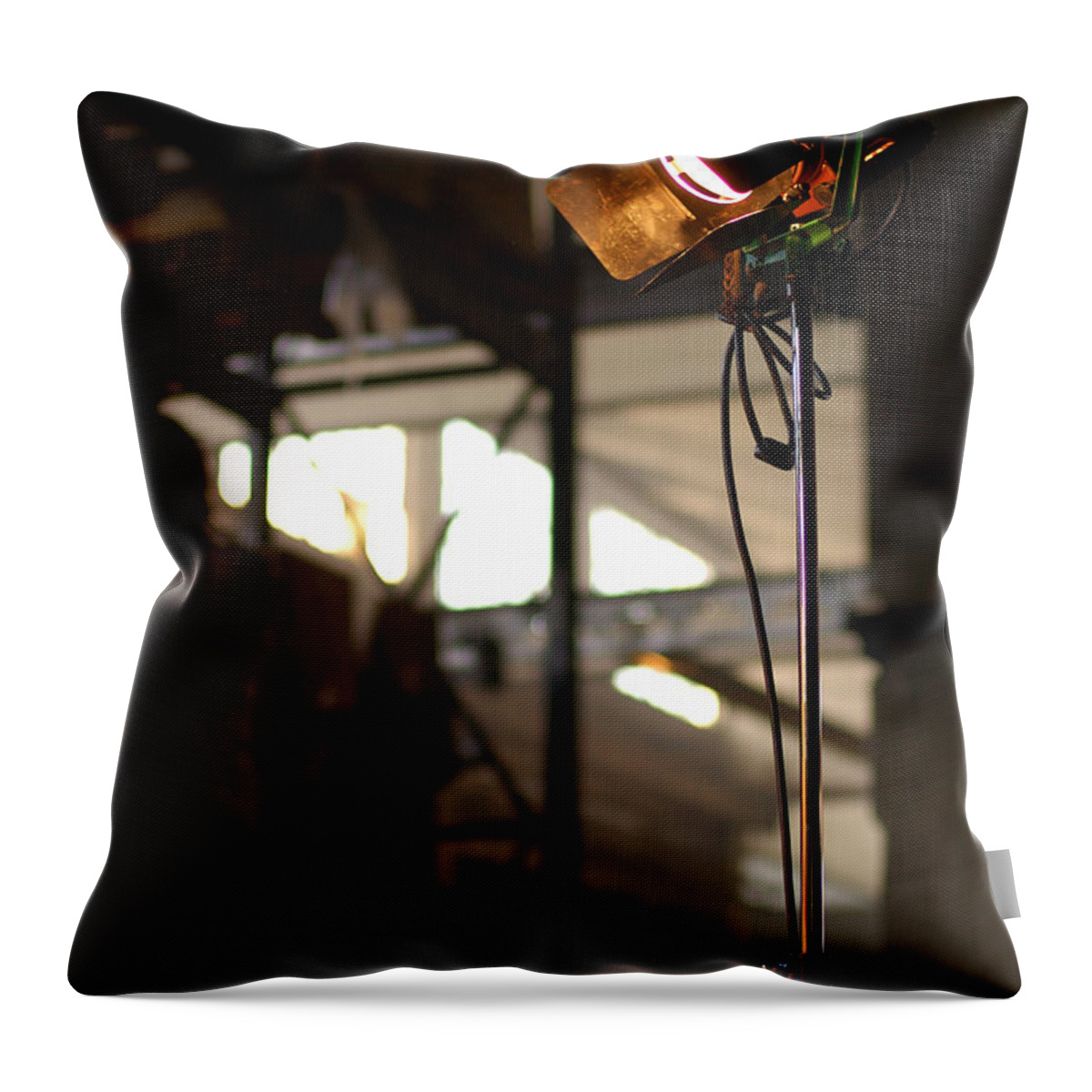 Movie Light Throw Pillow featuring the photograph Movie Light by Micah May
