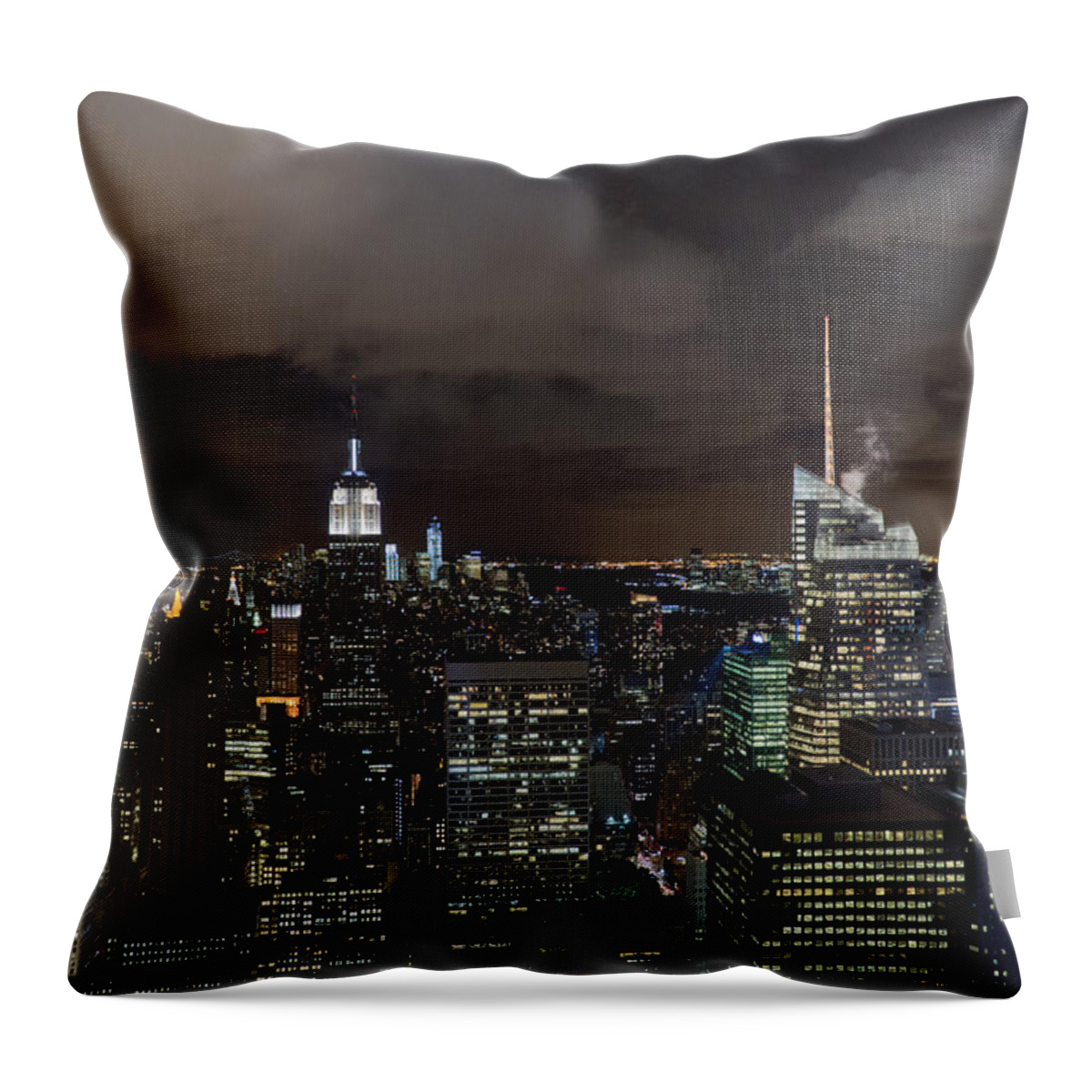 New York Skyline Throw Pillow featuring the photograph New York skyline at night by Gary Eason