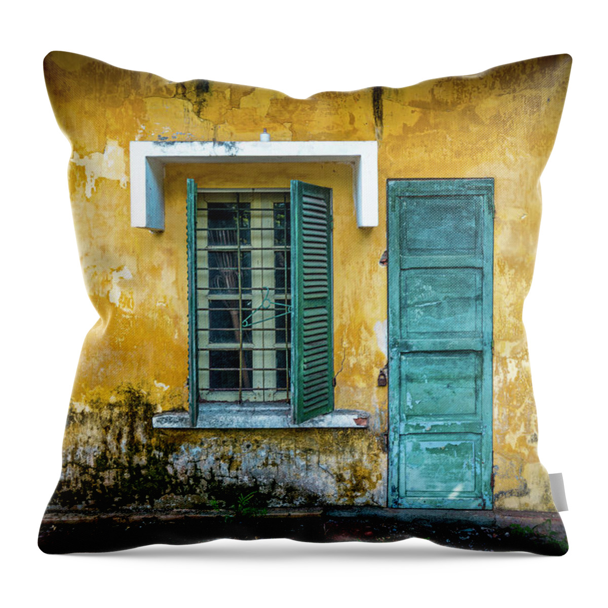 East Throw Pillow featuring the photograph Old And Worn House On Street In Vietnam by Kyolshin
