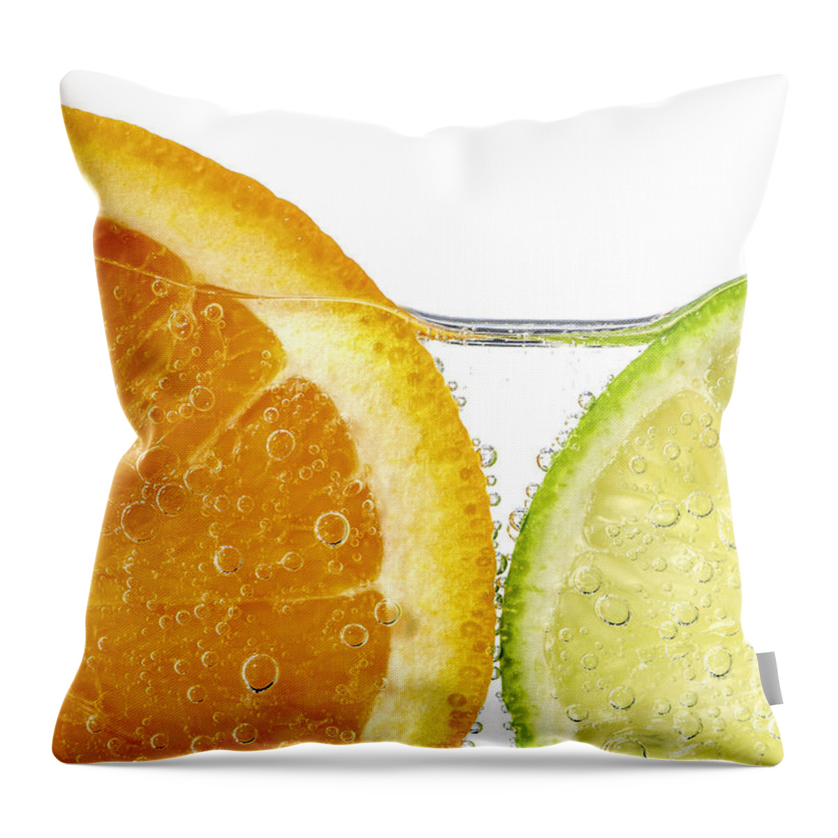 Orange Throw Pillow featuring the photograph Orange and lime slices in water by Elena Elisseeva