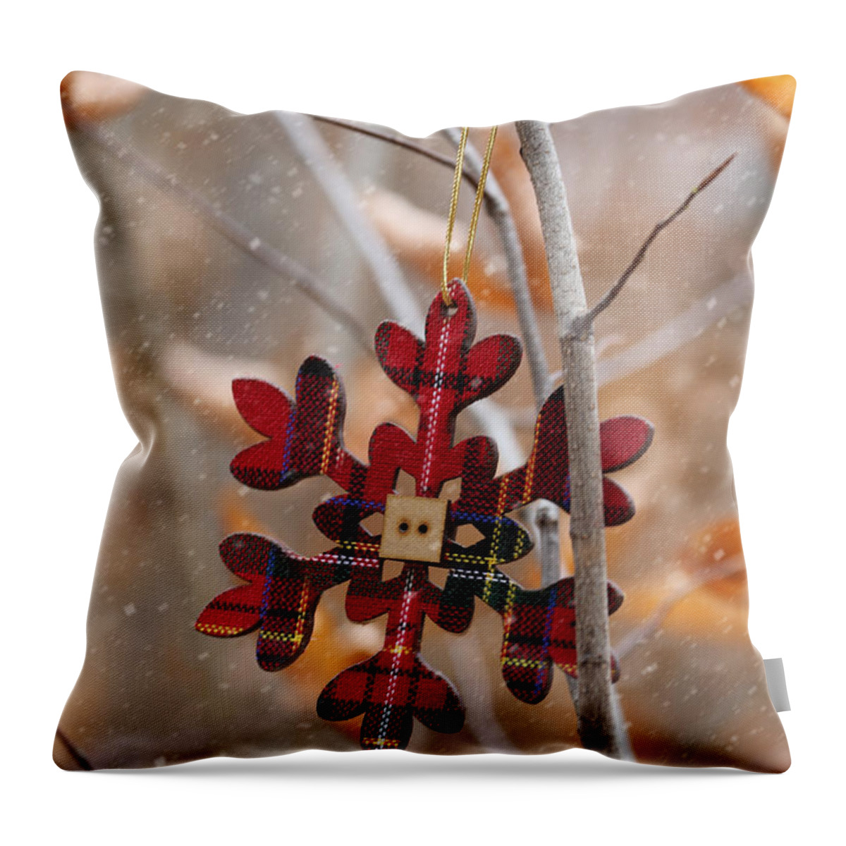 Antique Throw Pillow featuring the photograph Ornament hanging on branch with snow falling by Sandra Cunningham