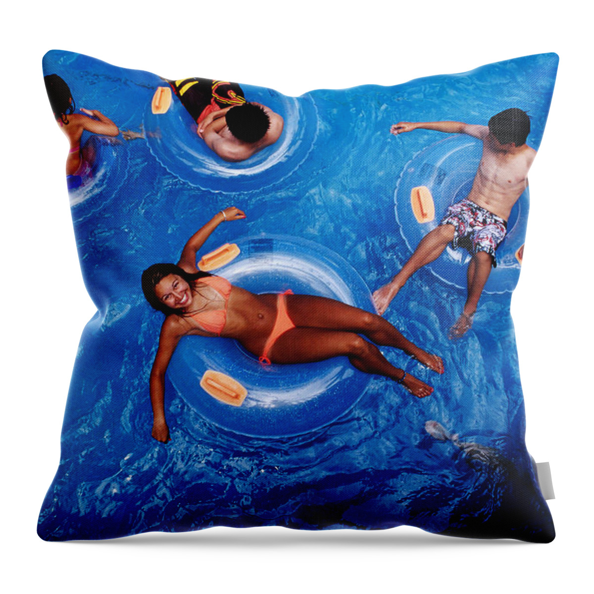 People Throw Pillow featuring the photograph People Floating In Pool On Rubber Rings by Richard I'anson