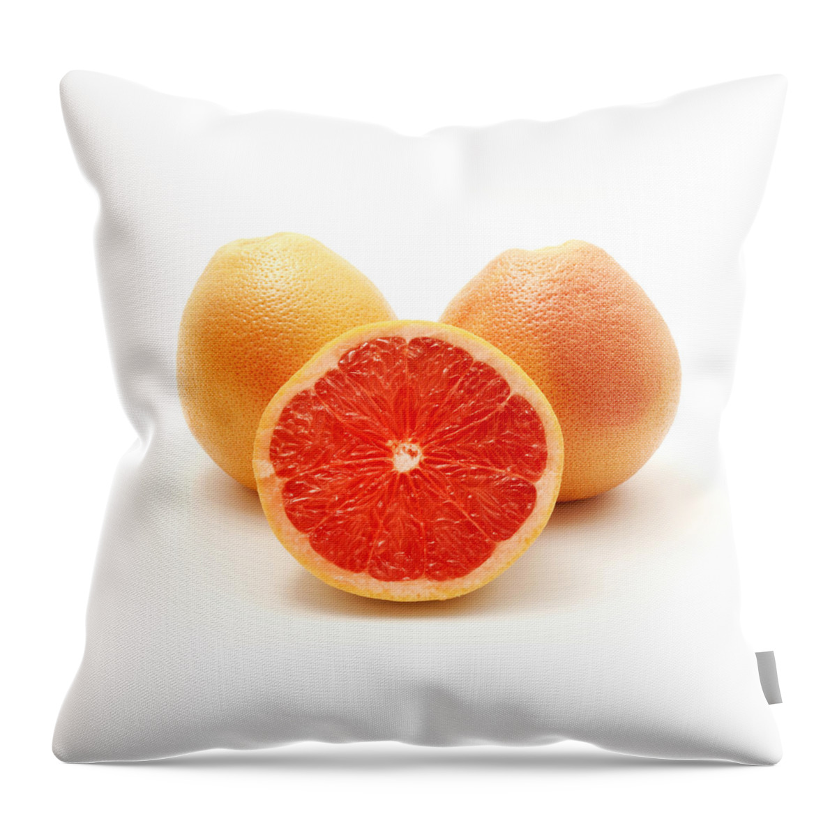 White Background Throw Pillow featuring the photograph Pink grapefruit by Fabrizio Troiani
