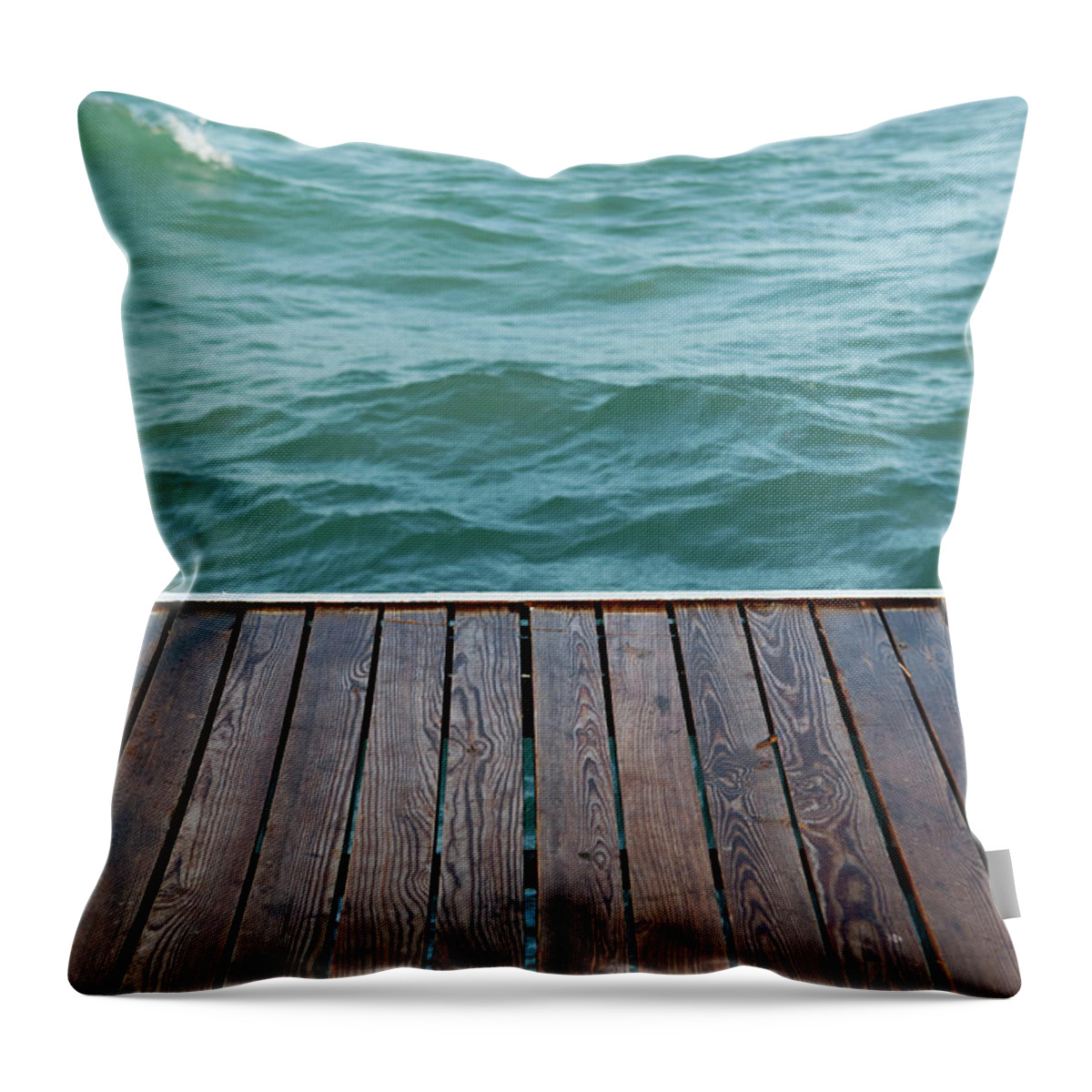 Water's Edge Throw Pillow featuring the photograph Platform Beside Sea by Mbtphotos