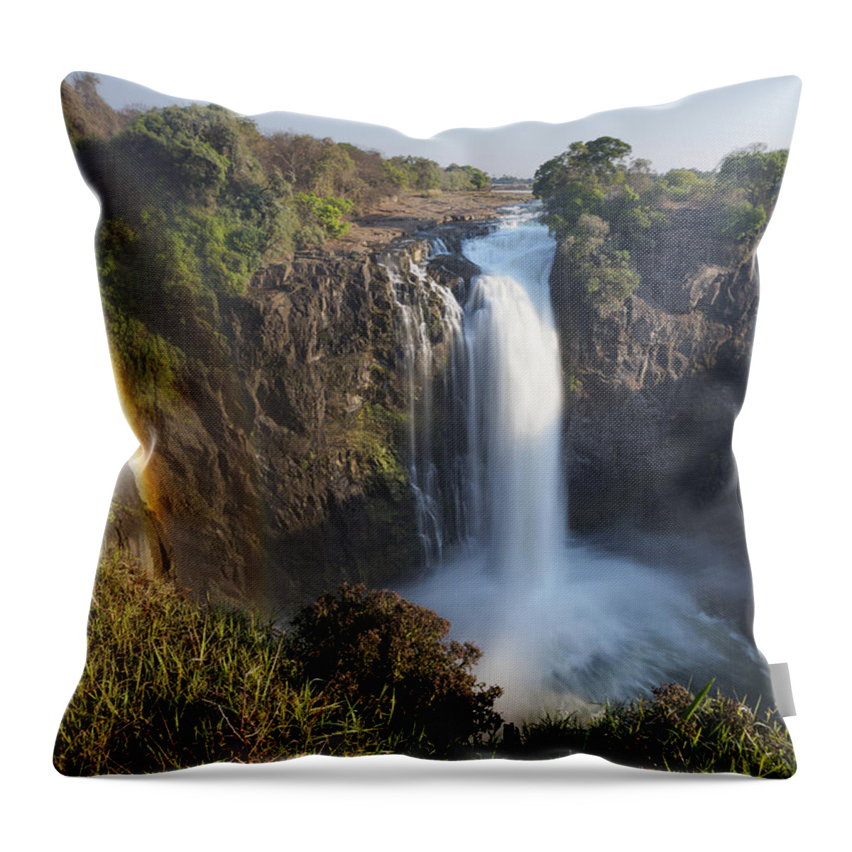Vincent Grafhorst Throw Pillow featuring the photograph Rainbow In The Mist Of Victoria Falls by Vincent Grafhorst