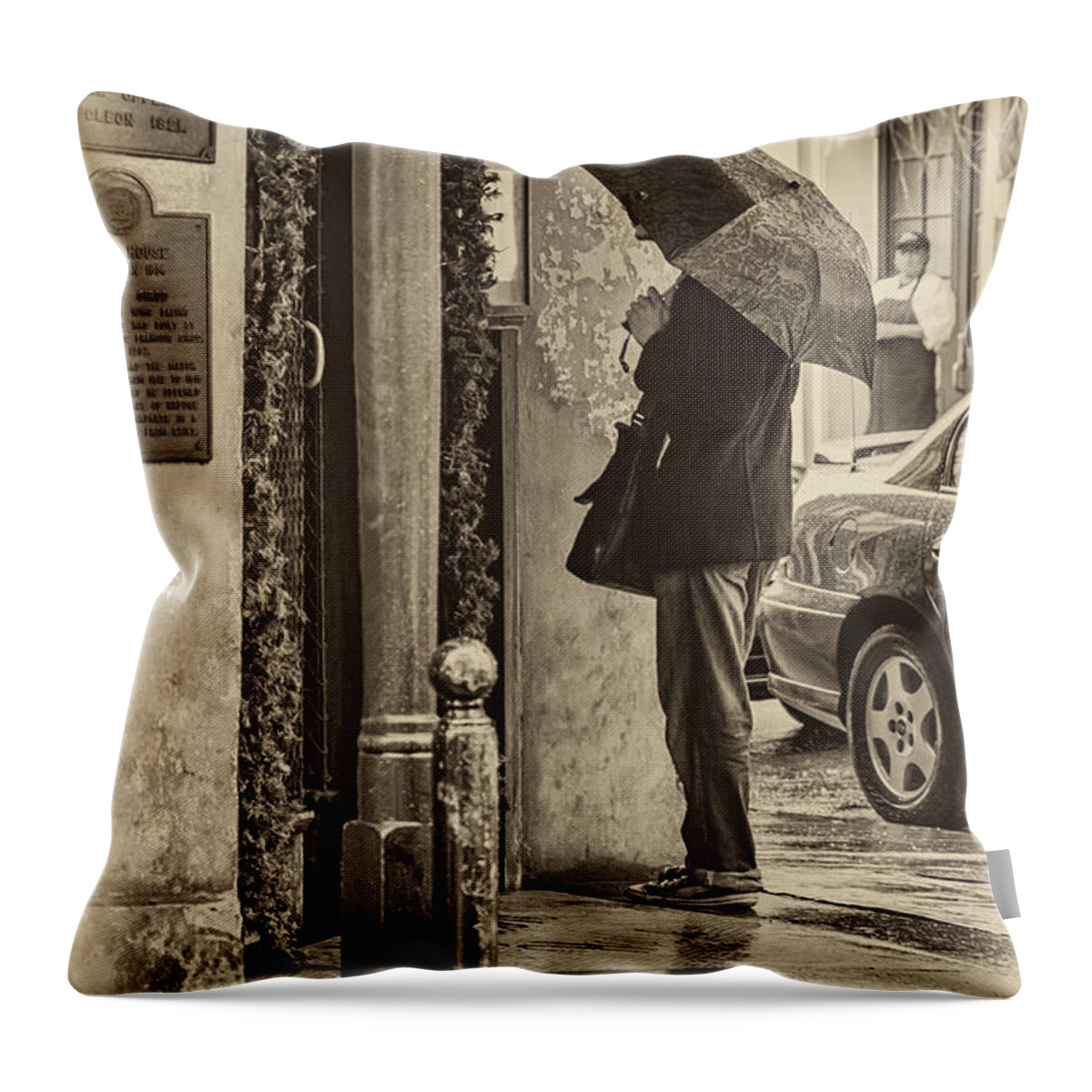Umbrella Throw Pillow featuring the photograph Rainy Day Menu Reading - Monochrome by Kathleen K Parker
