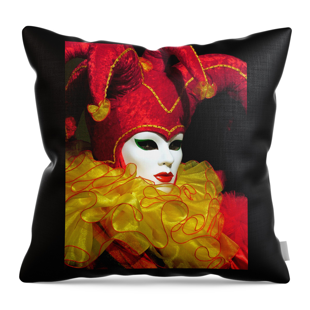 Venice Carnival Throw Pillow featuring the photograph Red and Yellow Jester by Donna Corless