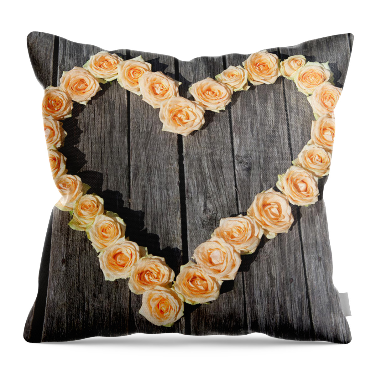 Orange Color Throw Pillow featuring the photograph Roses Arranged In Heart Shape by Judith Haeusler