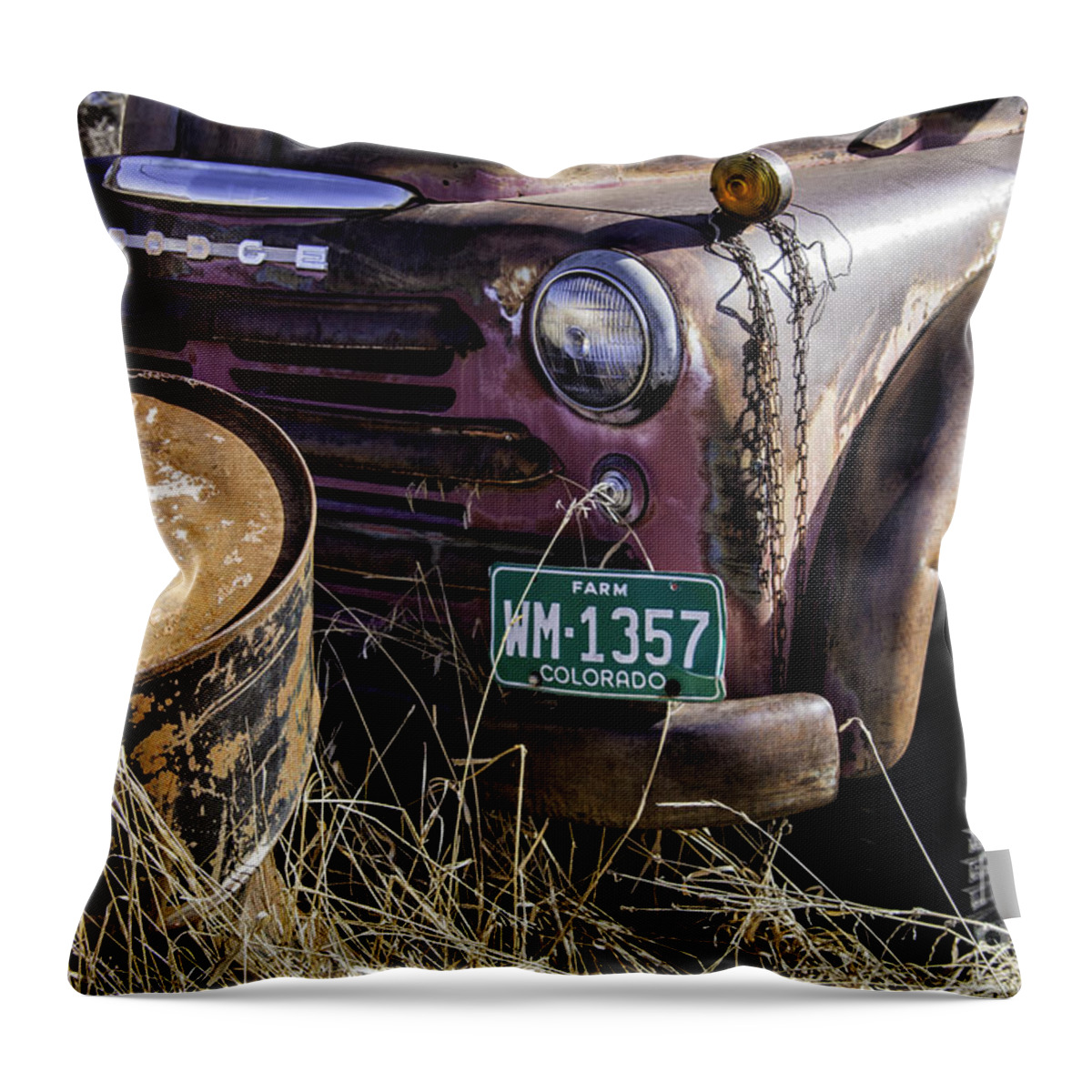 Colorado Throw Pillow featuring the photograph Rusty Truck and Barrel by Timothy Hacker