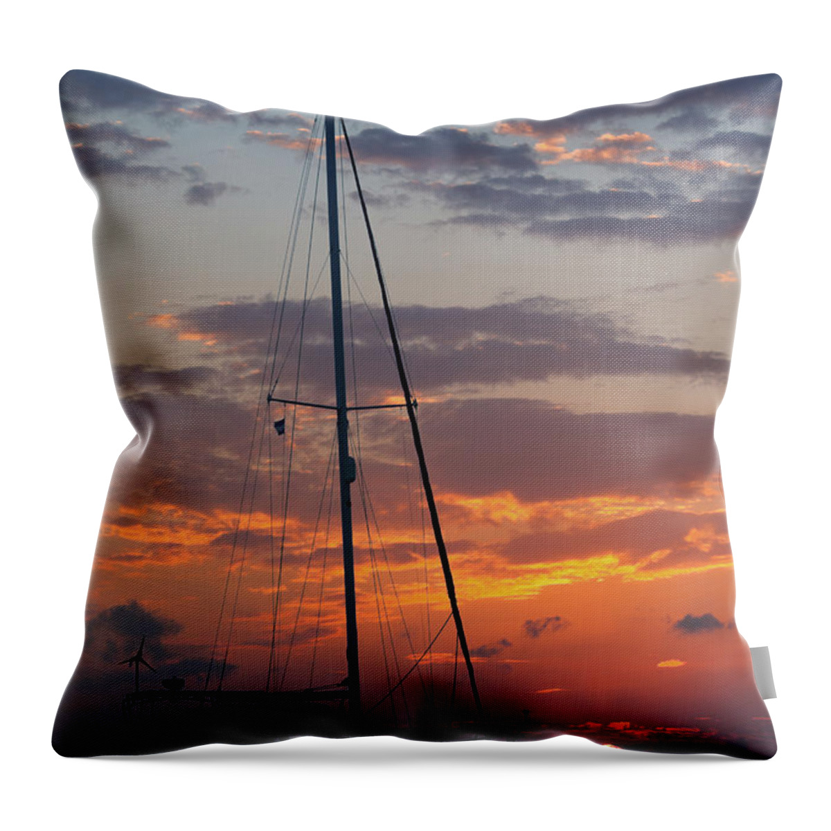 Sailboat Throw Pillow featuring the photograph Sailboat At Sunset by Thepalmer