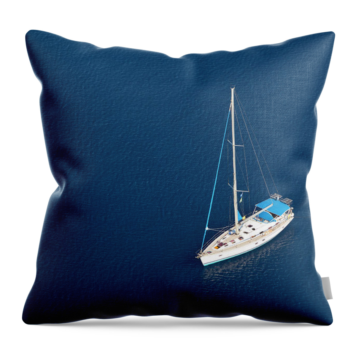 Greek Culture Throw Pillow featuring the photograph Sailboat In Blue Water by Michaelutech