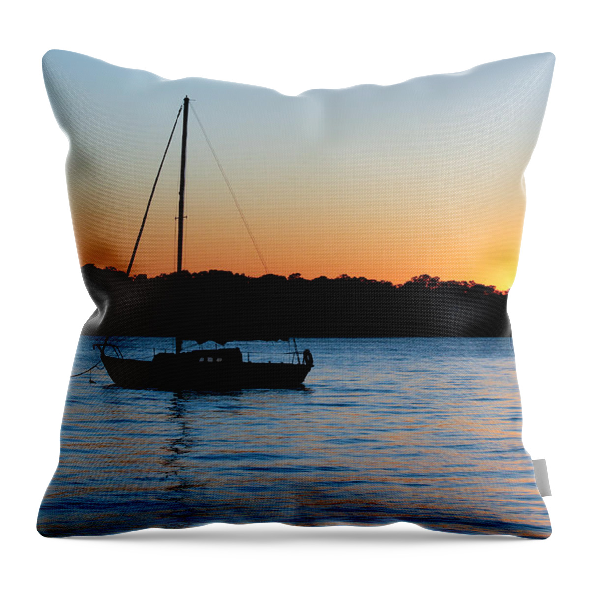 Sunset Throw Pillow featuring the photograph Sailboat Moored at Sunset by Ann Murphy