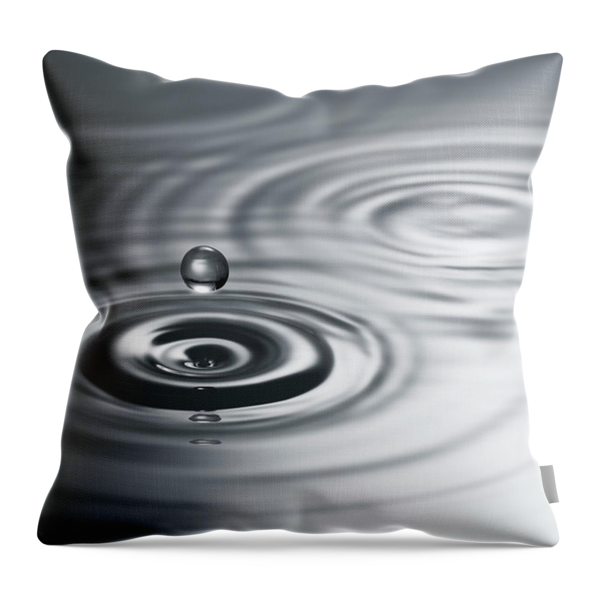 Tranquility Throw Pillow featuring the photograph Single Grey Drip On Rippled Surface by Anthony Bradshaw