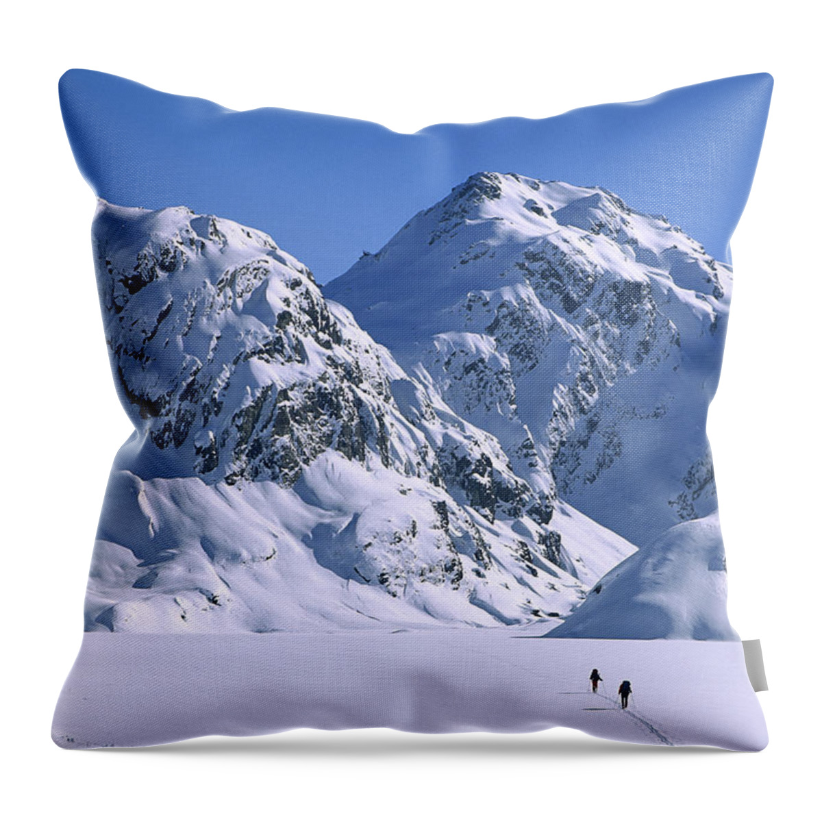 Feb0514 Throw Pillow featuring the photograph Skiers Cross Frozen Lake Harris by Colin Monteath