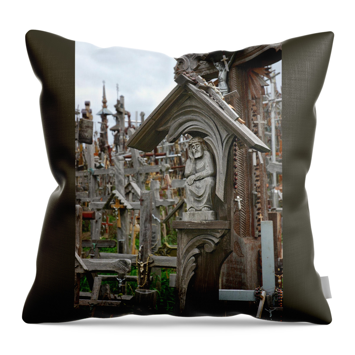 Lithuania Throw Pillow featuring the photograph Sorrowful Christ Lithuania Hill of Crosses by Mary Lee Dereske
