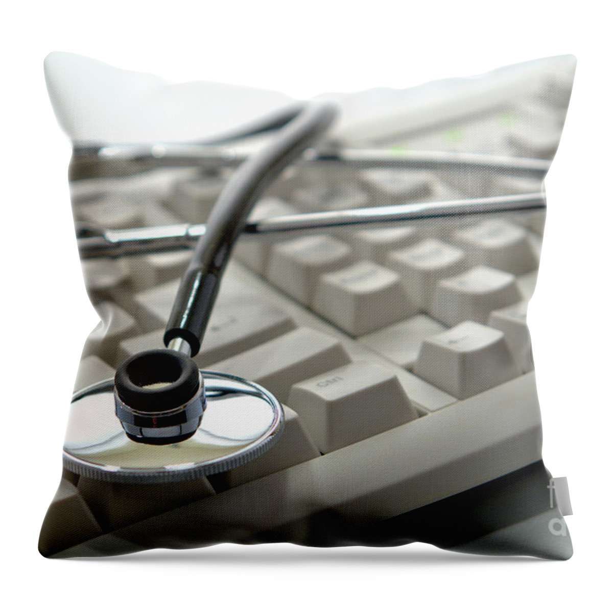Stethoscope Throw Pillow featuring the photograph Stethoscope on Computer Keyboard by Olivier Le Queinec