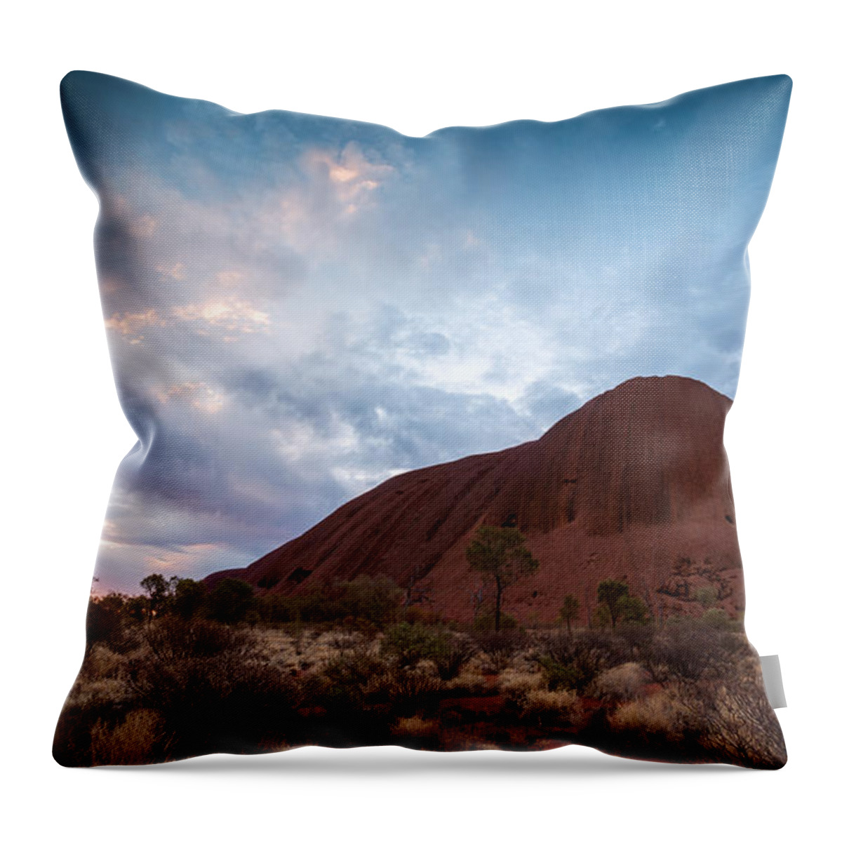 Uluru Throw Pillow featuring the photograph Stormy sky over Uluru by Matteo Colombo
