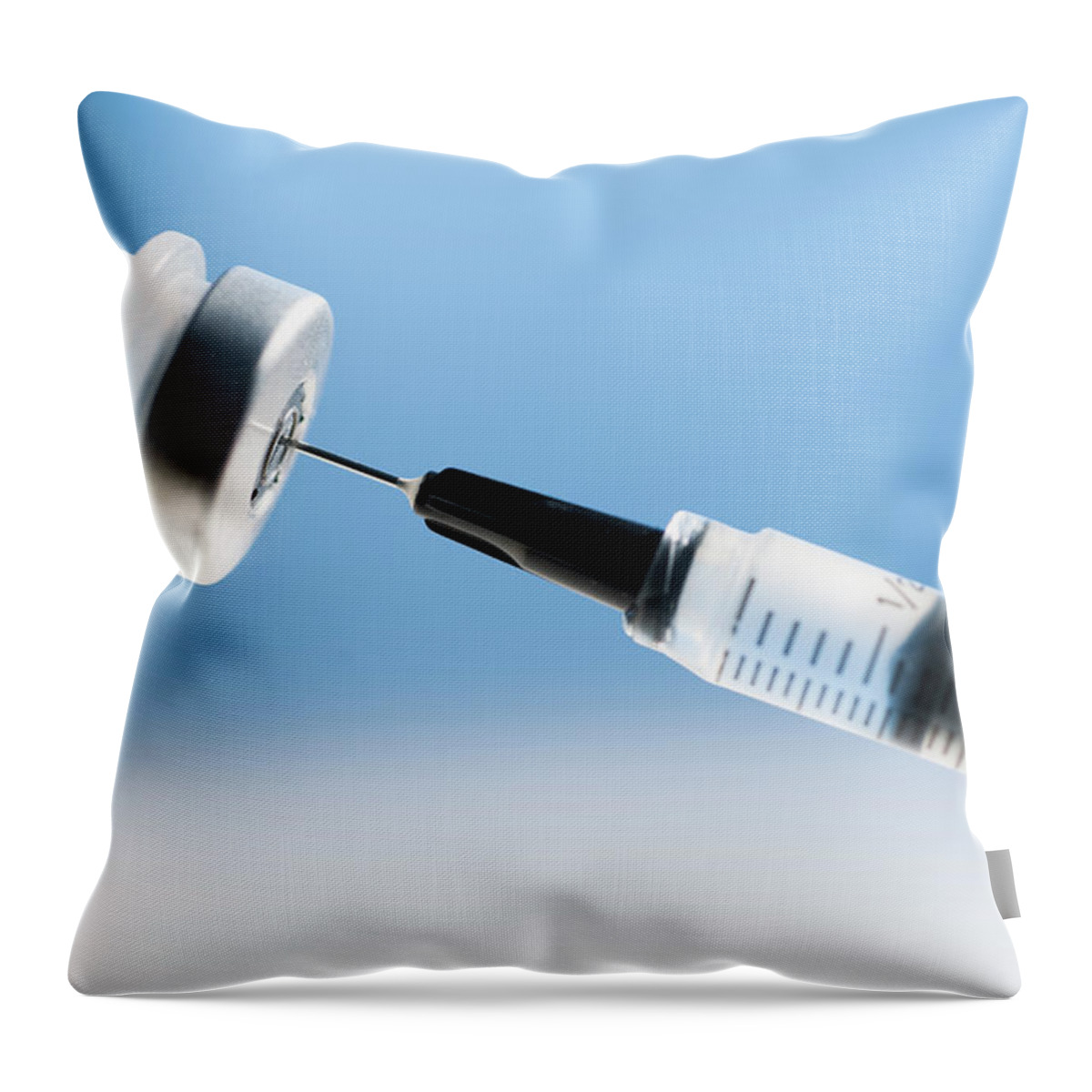 Two Objects Throw Pillow featuring the photograph Studio Shot Of Syringe And Vial by Tetra Images