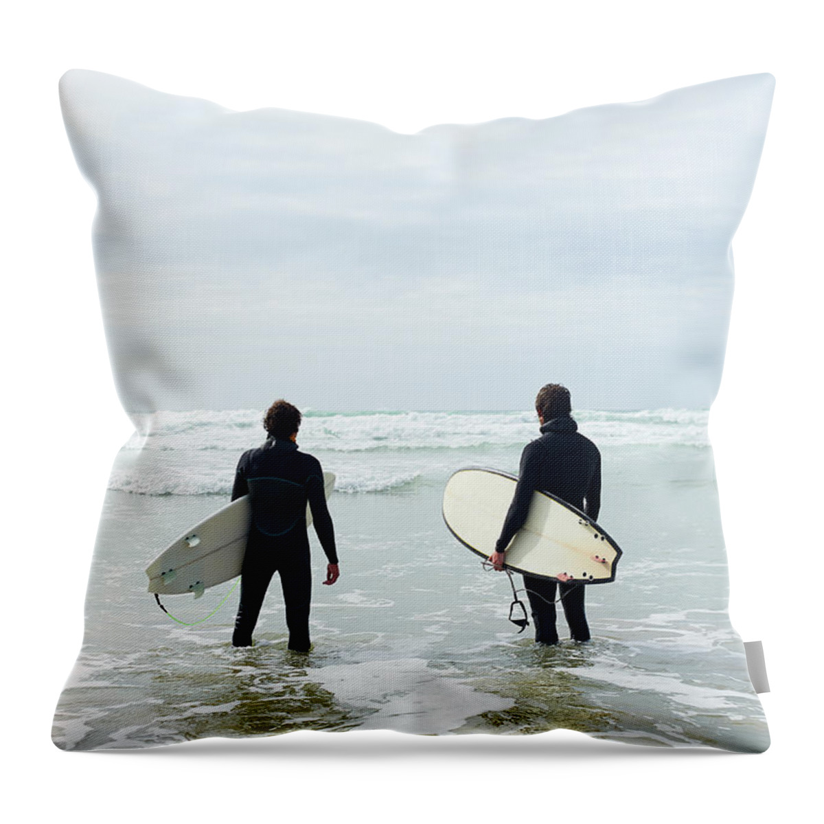 People Throw Pillow featuring the photograph Surfers Stand With Their Boards Looking by Dougal Waters