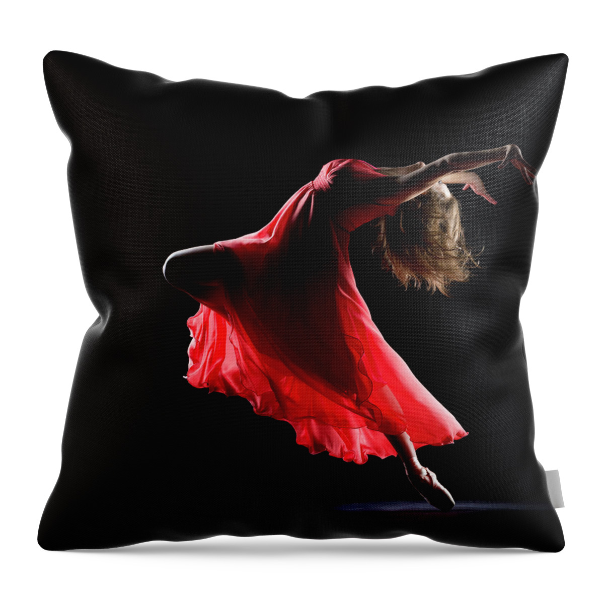 Ballet Dancer Throw Pillow featuring the photograph The Dancer On Black Background by Proxyminder