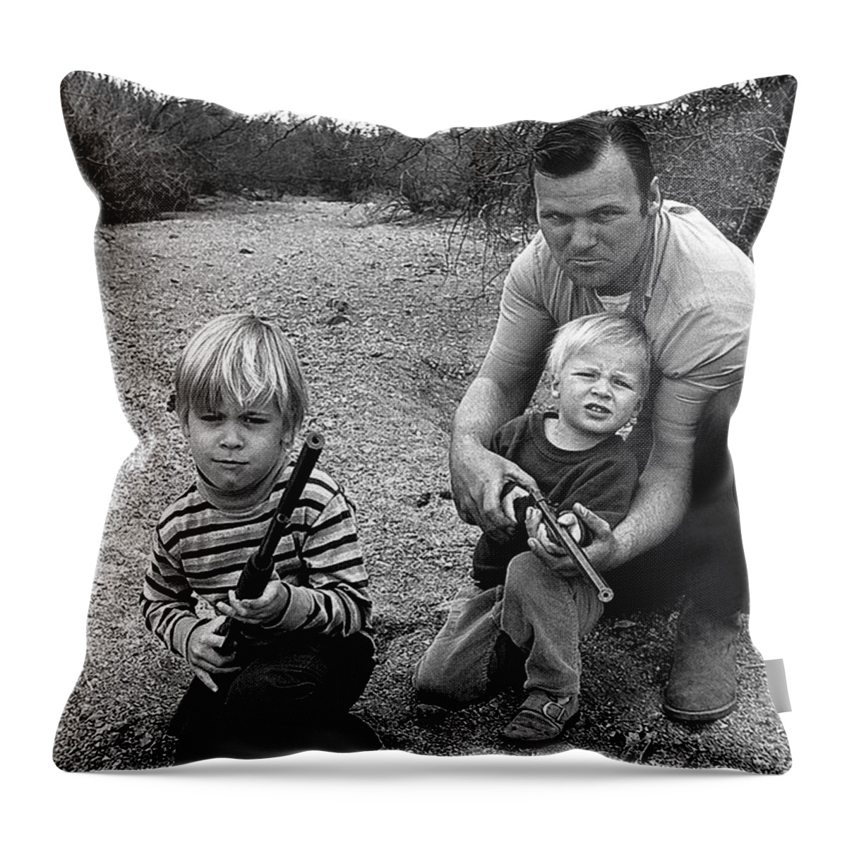 The Green Berets Homage 1968 Barry Sadler And Sons Tucson Arizona John Wayne Toy Guns Black And White Dry River Bed Throw Pillow featuring the photograph The Green Berets homage 1968 Barry Sadler and sons Tucson Arizona by David Lee Guss