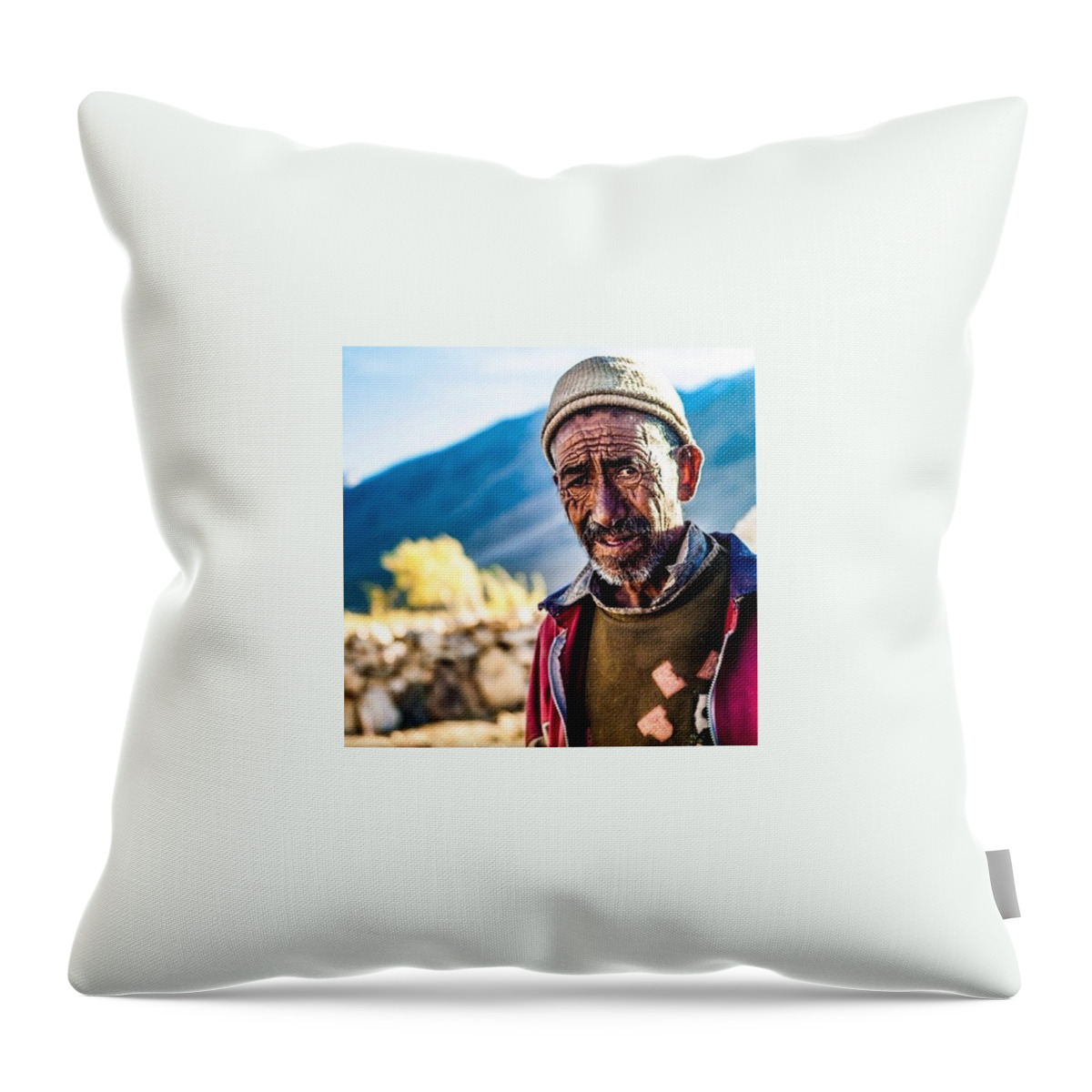 Northindia Throw Pillow featuring the photograph The Lines On His Face by Aleck Cartwright